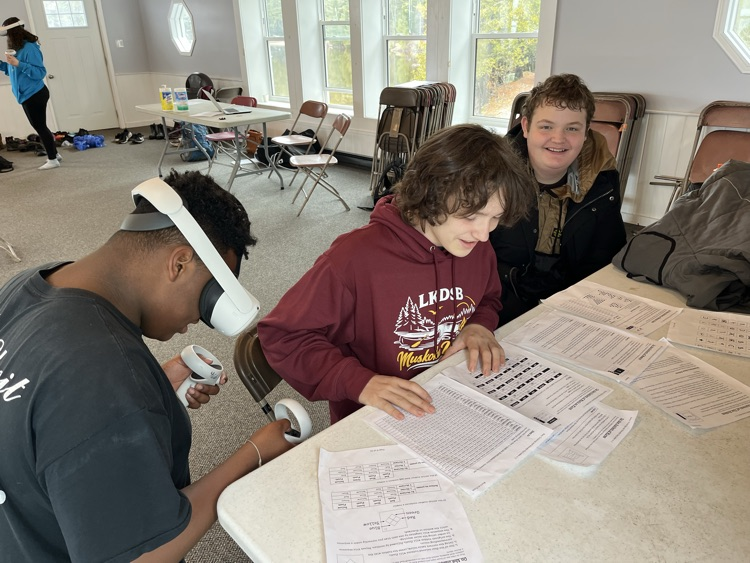 students using virtual reality headset