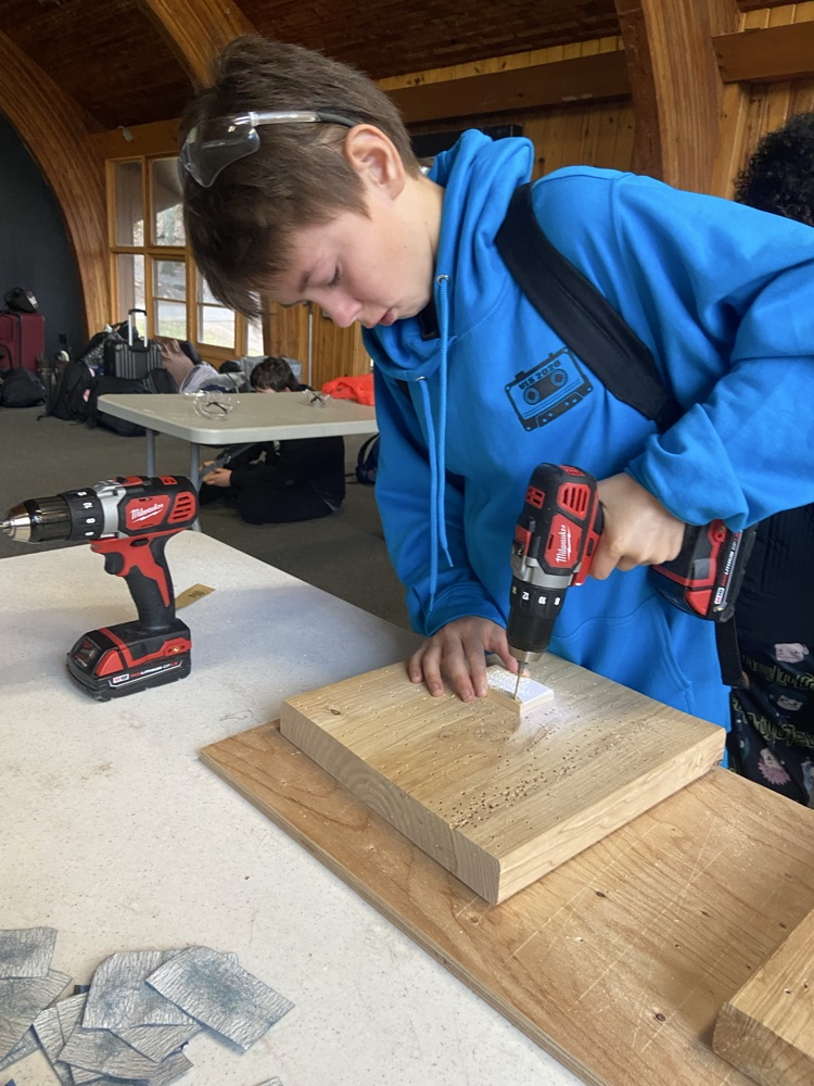 Student using a drill