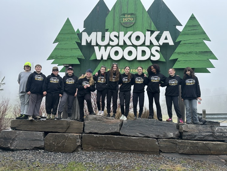 Muskoka Woods - Grade 8 students in front of Muskoka Woods sign