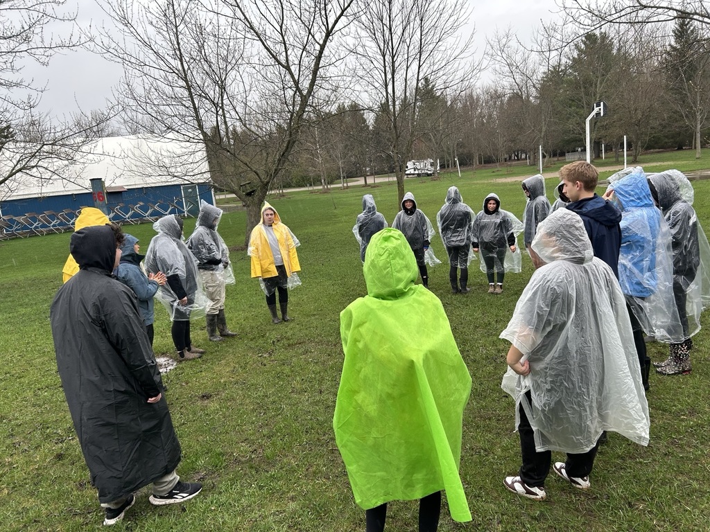 Students with ponchos learning and beginning the healing walk