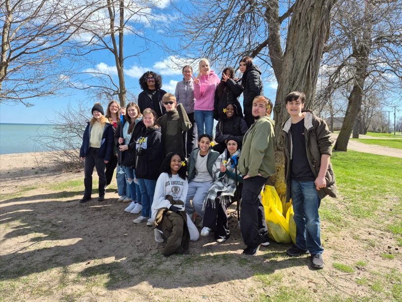 Students cleaning up the beach
