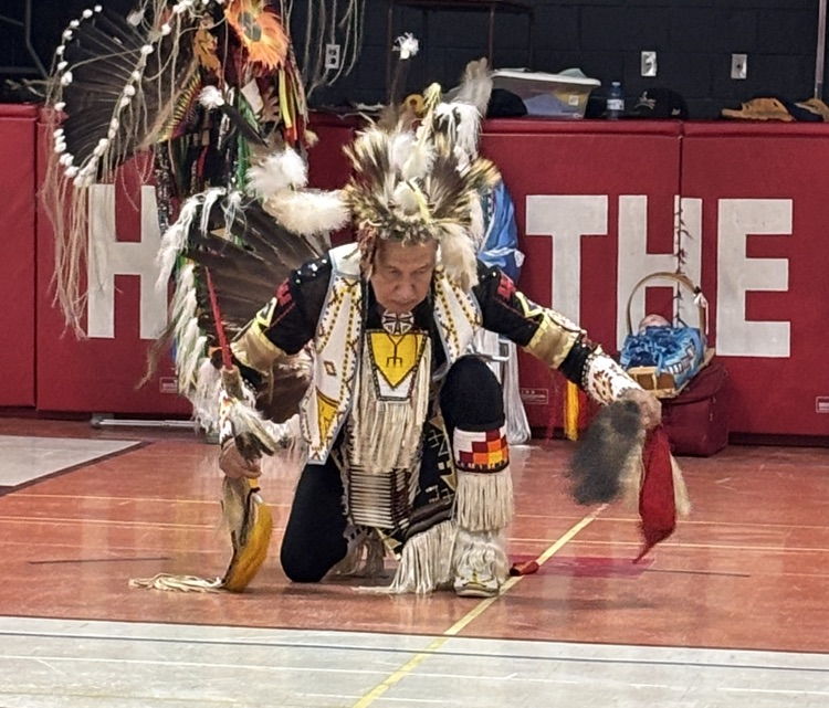 Traditional regalia on a male indigenous dance