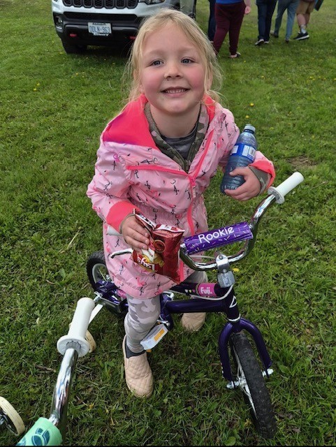 young girl with new bike