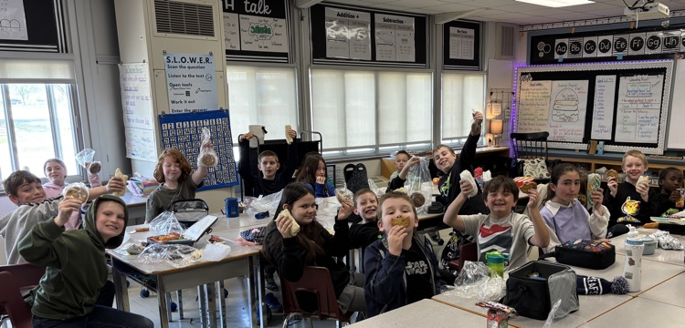students eating lunch in their classroom