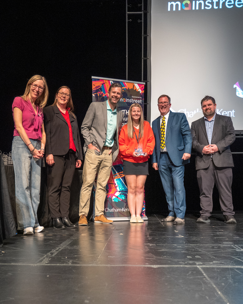 Student receiving award