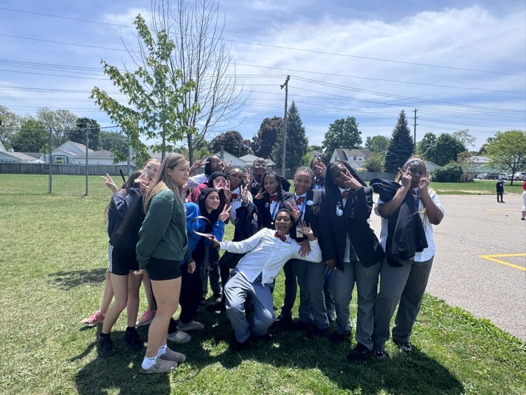 Student students sharing dance moves with one another outdoor outdoors