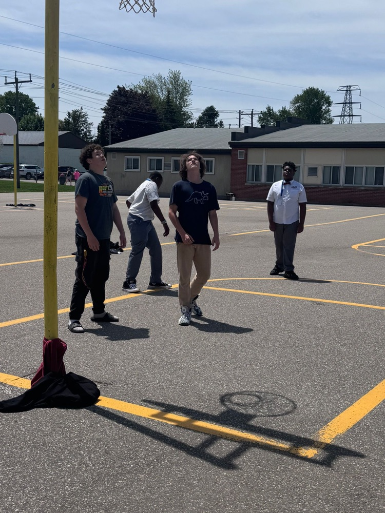 Students playing basketball