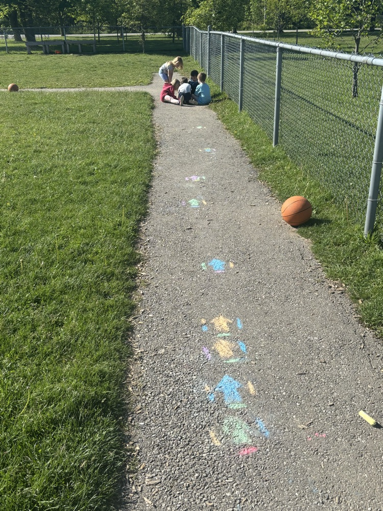 student coding to the house they drew 