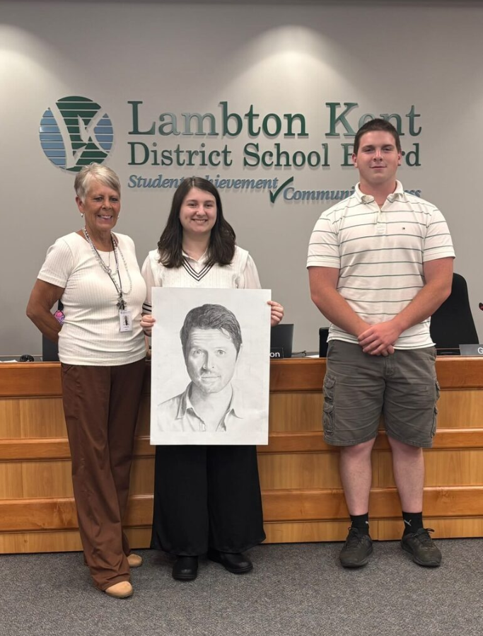 Student with art work