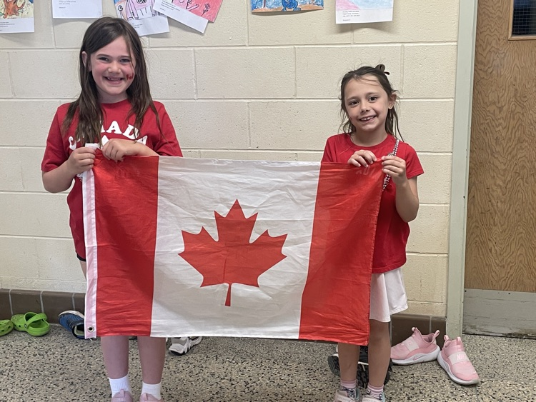 students with Canadian flag