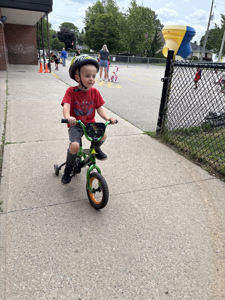 student riding a bicycle