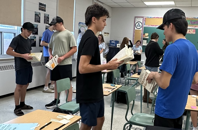 ENG4U students discussing their thoughts and connections after reading