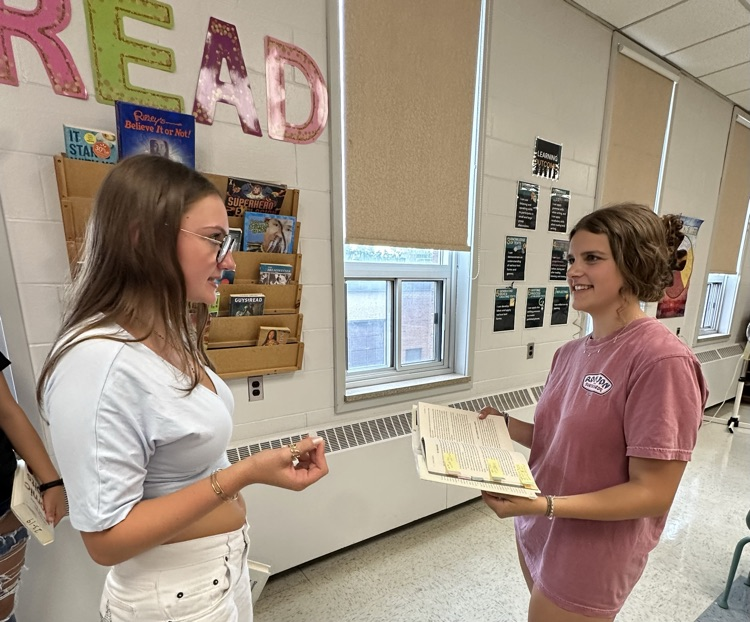 ENG4U students discussing their thoughts and connections after reading