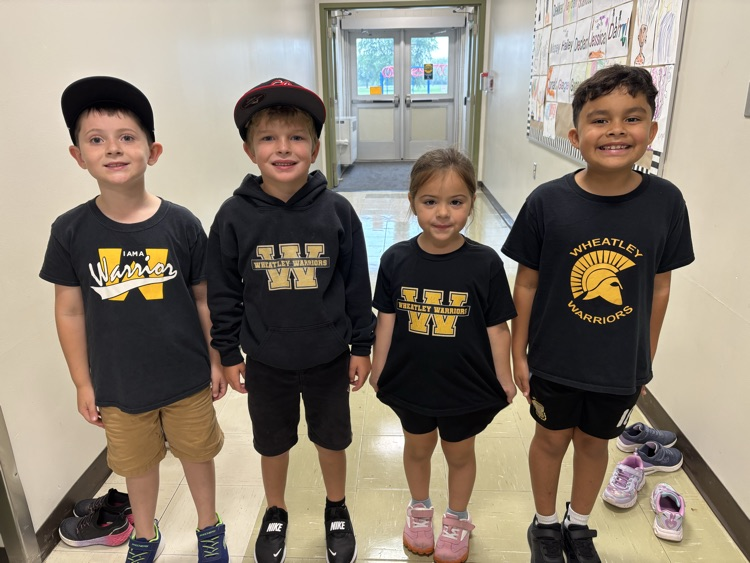 Grade 1/2 sporting their Warrior shirts on Warrior Wednesday