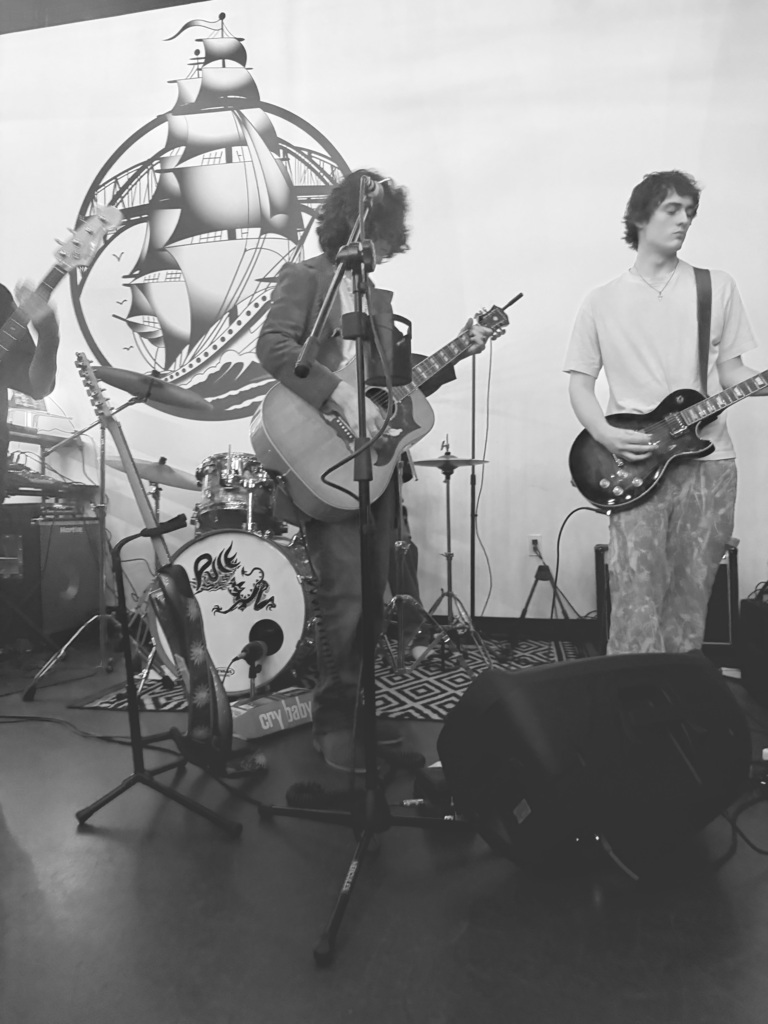 Noah on vocals and guitar.