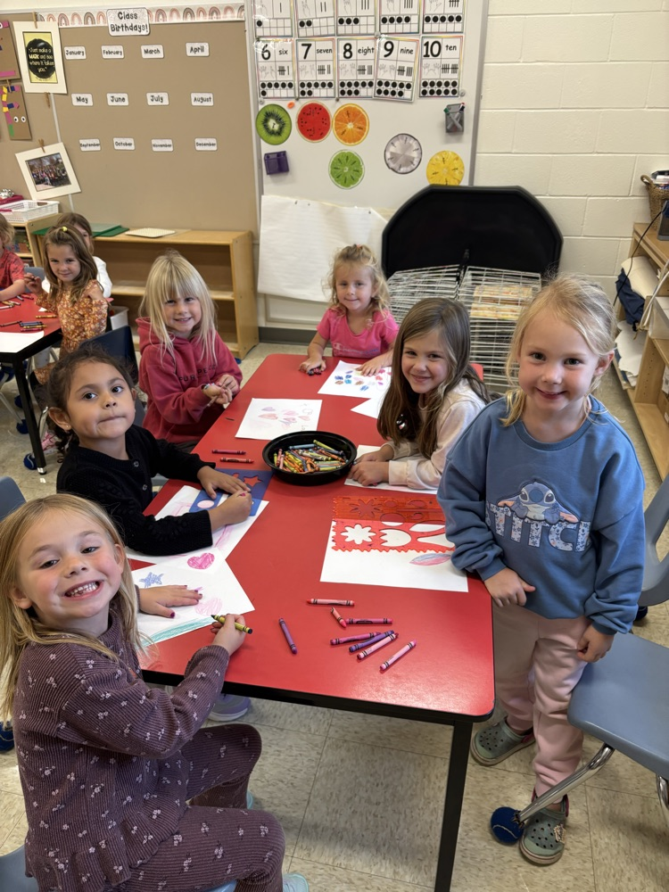 FDK students at the drawing table making pictures