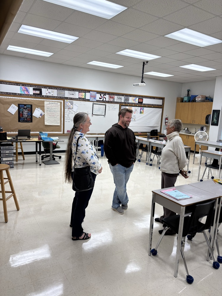 trustees connecting with staff members 