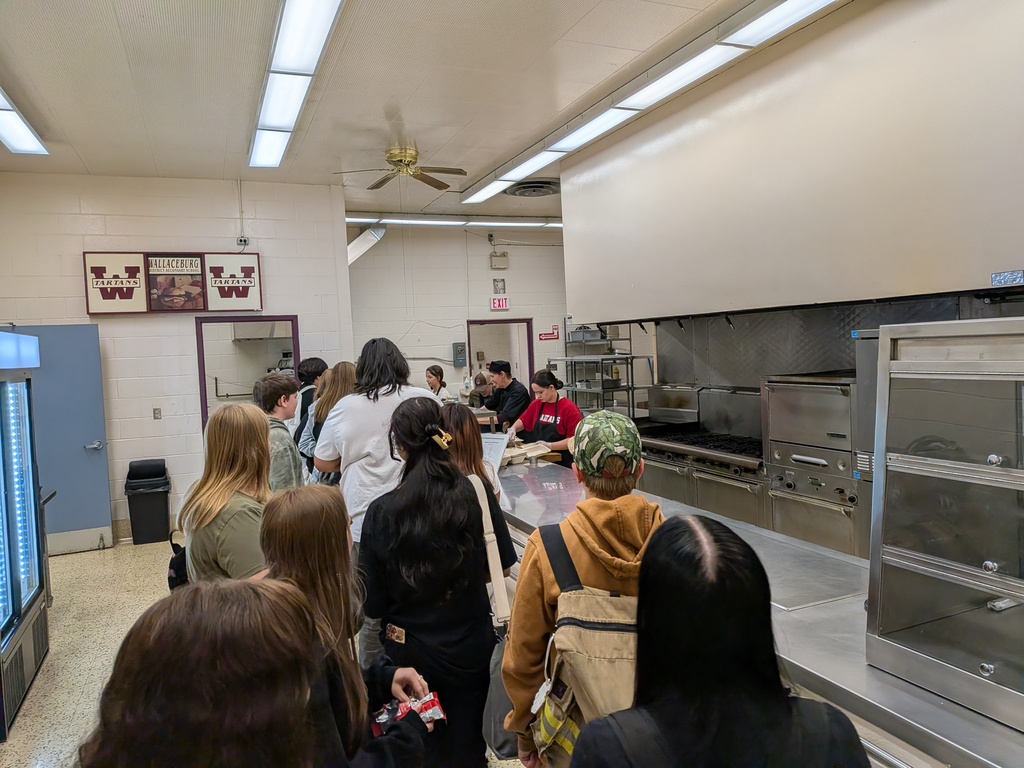 Students waiting in line at the cafeteria for the amazing food