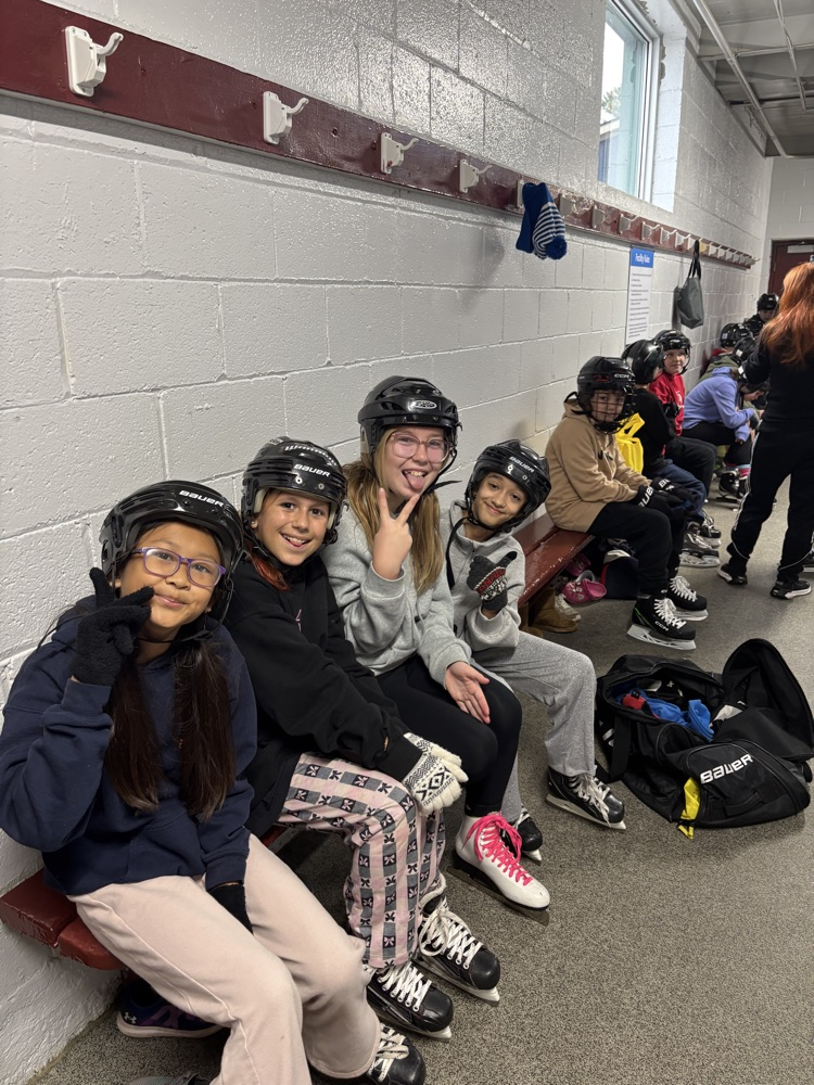 kids waiting on the bench to go skating