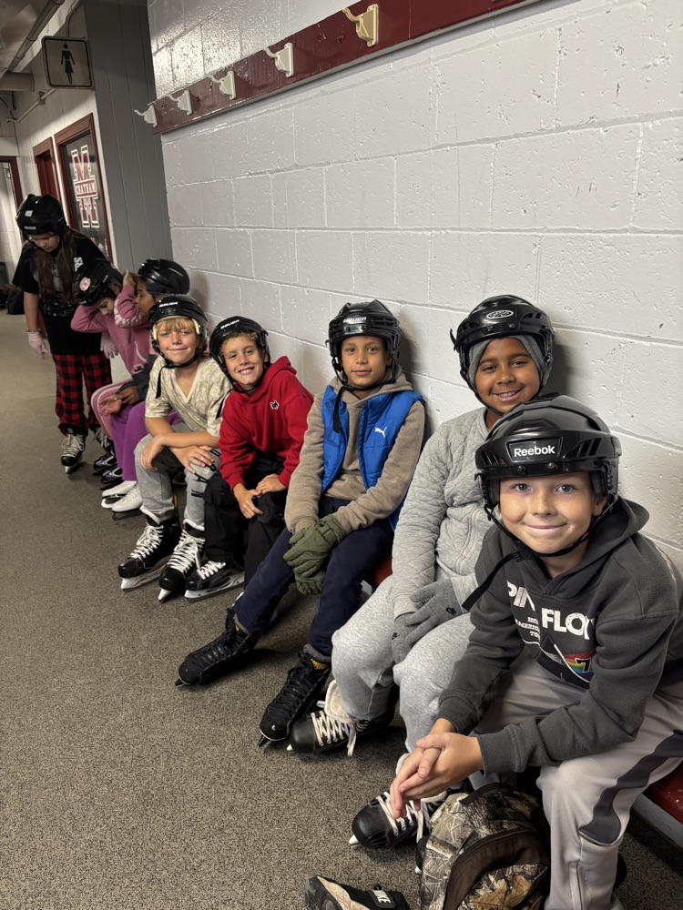 Kids waiting on the bench to go
