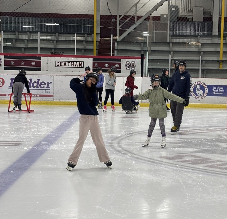 Kids skating at the arena
