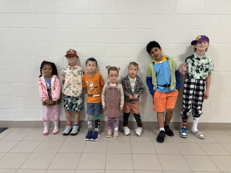 a collection of students wearing mismatched clothing