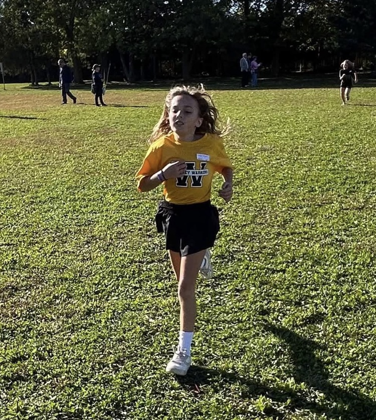 Primary girl cross-country runner