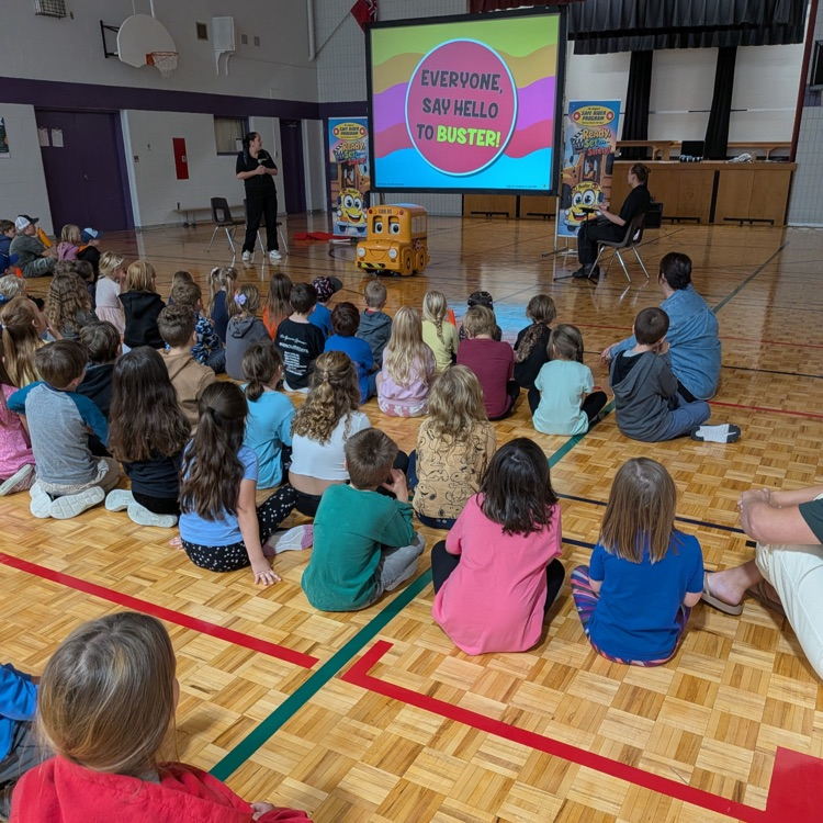 student bus safety presentation in the gym