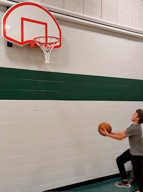 Boy playing basketball