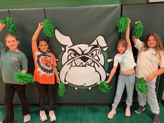 girls with mascot picture