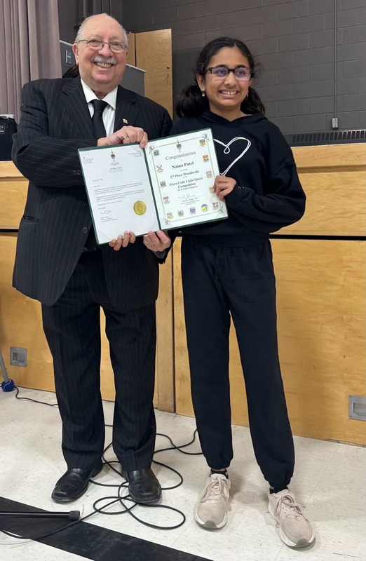 Naina Patel receives special congratulations from MPP Bob Bailey as Rosedale Public School recognized Naina’s achievement during a school-wide assembly.