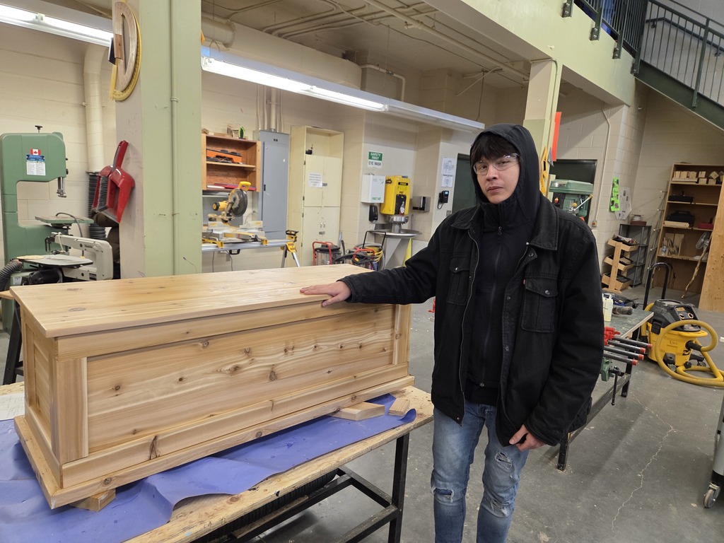 Finished handmade cedar chests made by students at Rossignol High School