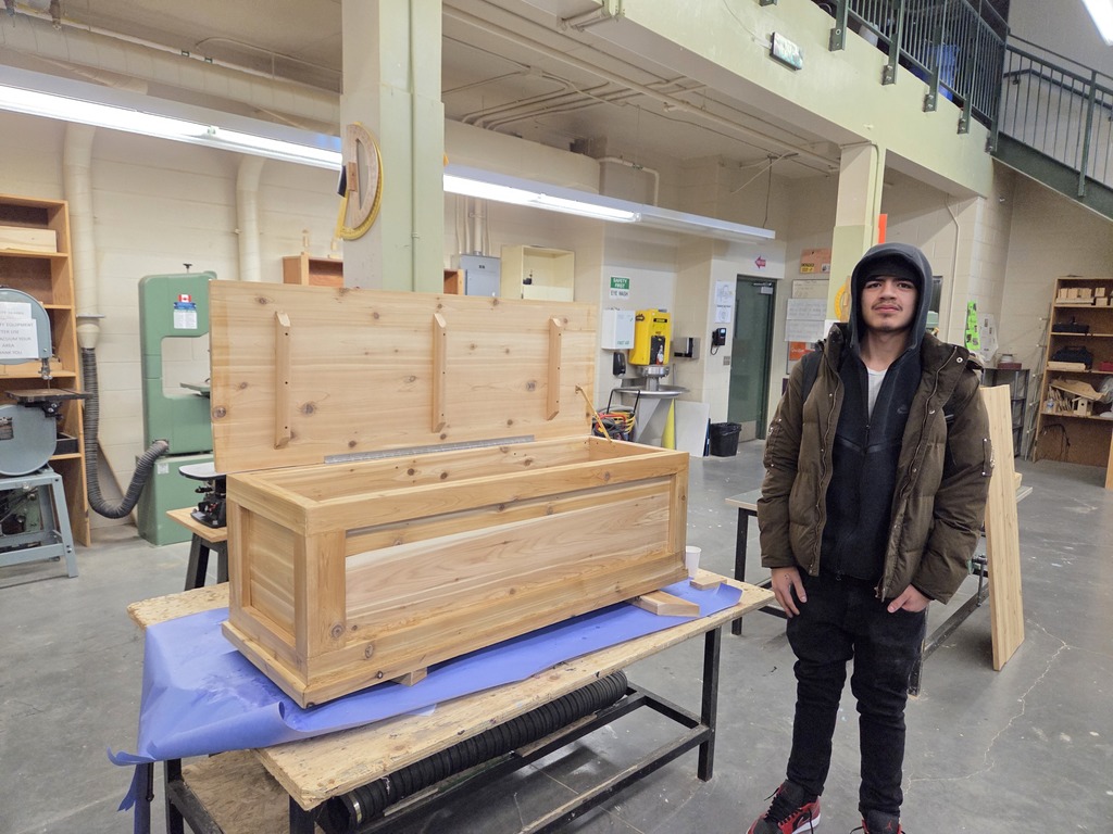 Finished handmade cedar chests made by students at Rossignol High School