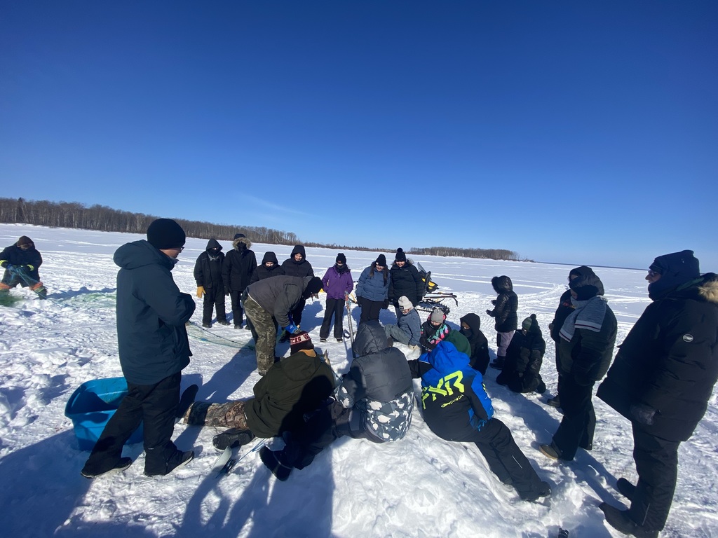 students ice fishing