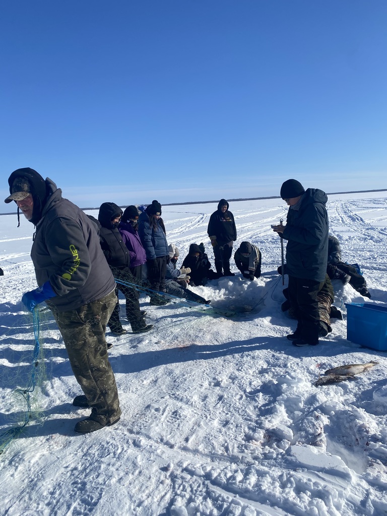 students ice fishing