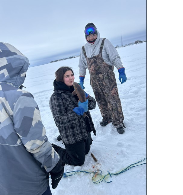 students ice fishing