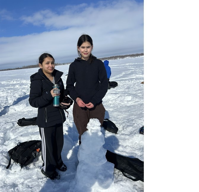 students ice fishing
