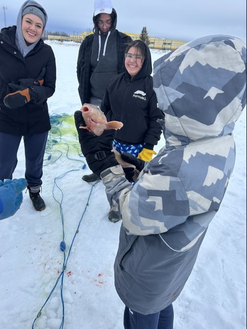 students ice fishing