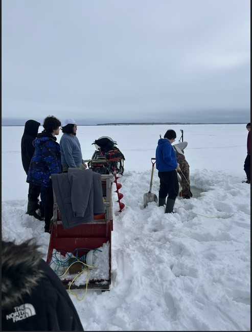 students ice fishing
