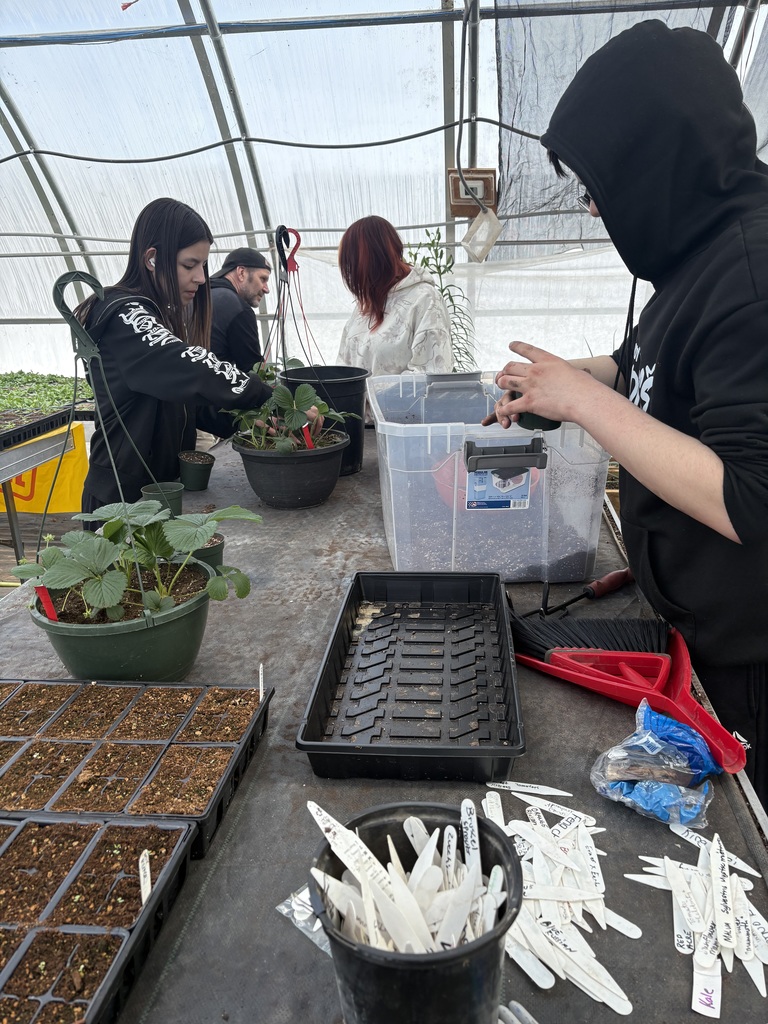 students in green house