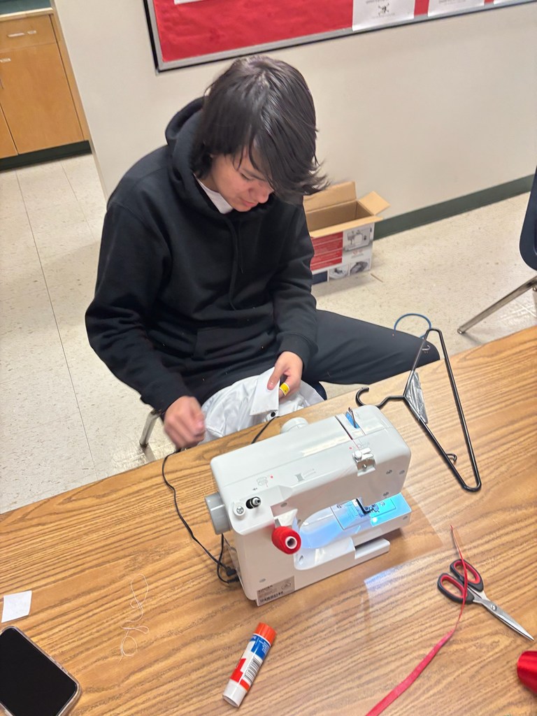 students sewing