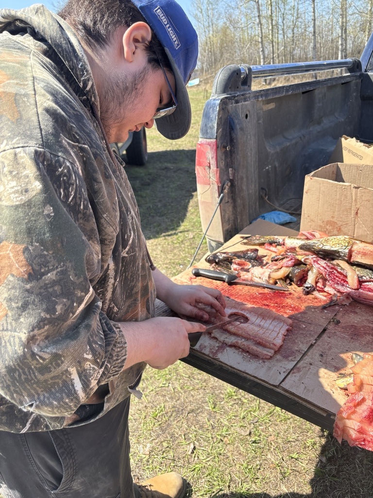 students making fish