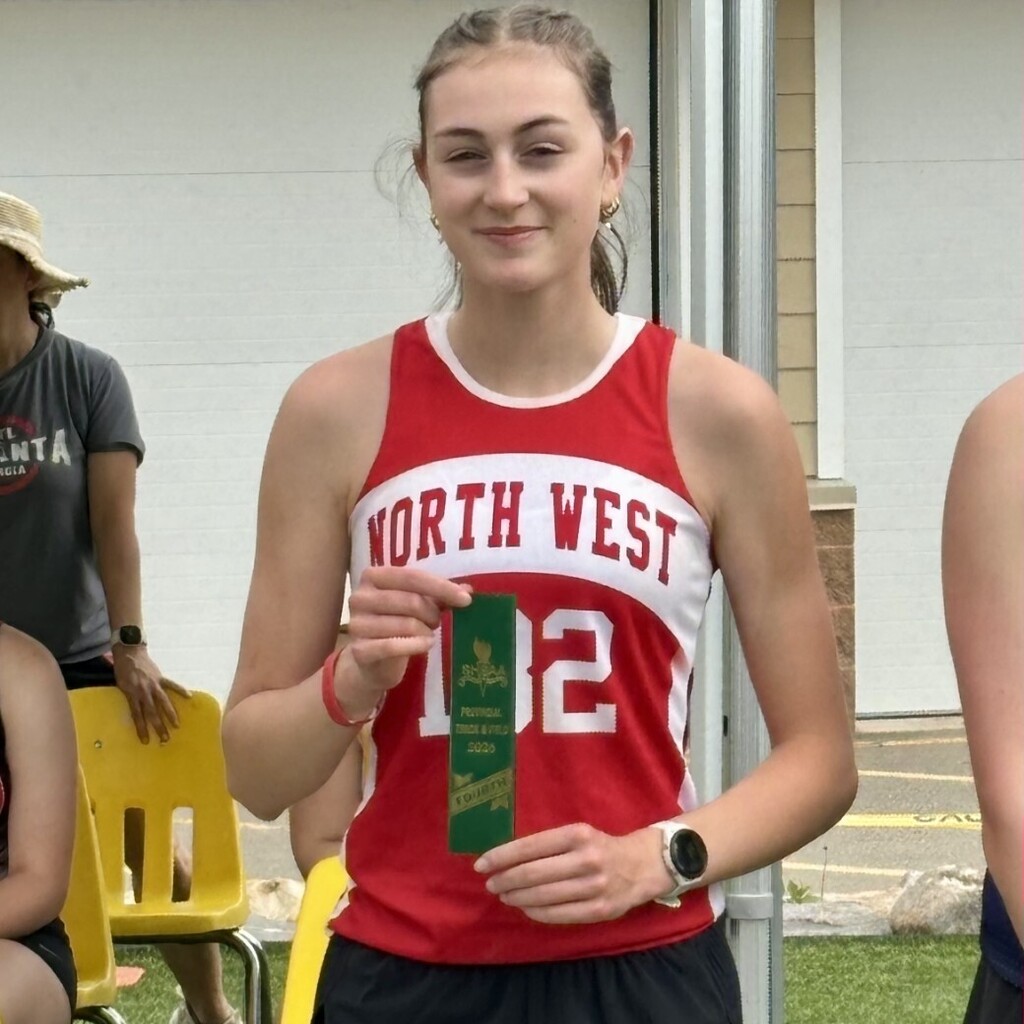 Student receives ribbon