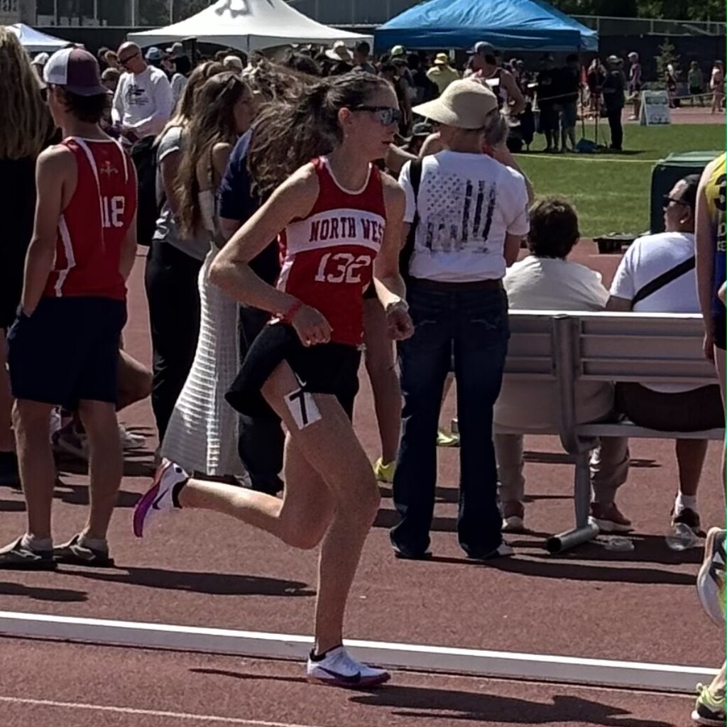 Track and field student running
