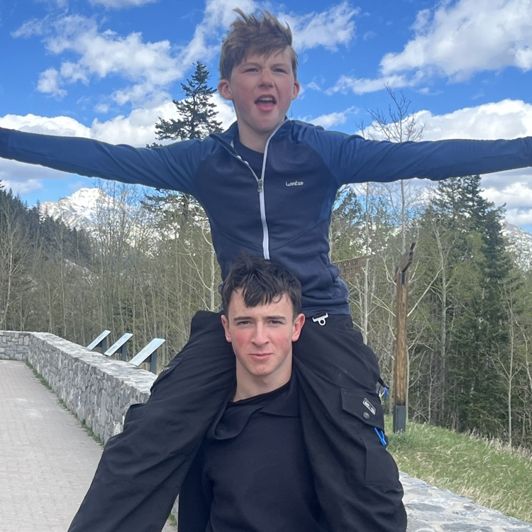 boys on shoulders