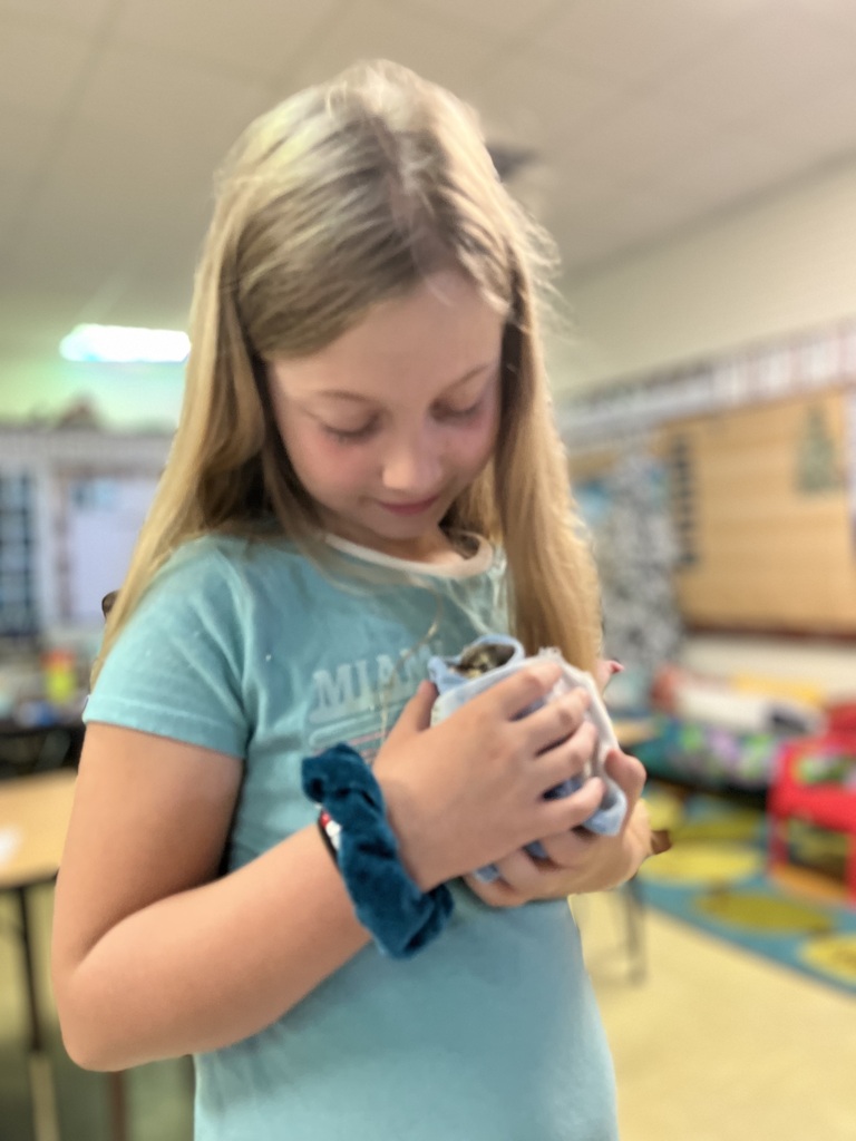 student with chick