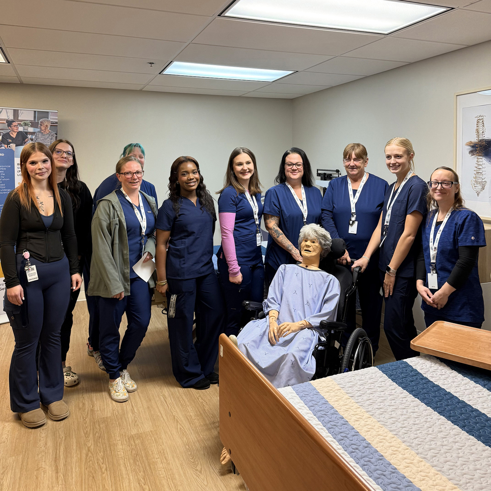 A group of PSW students pose for a photo