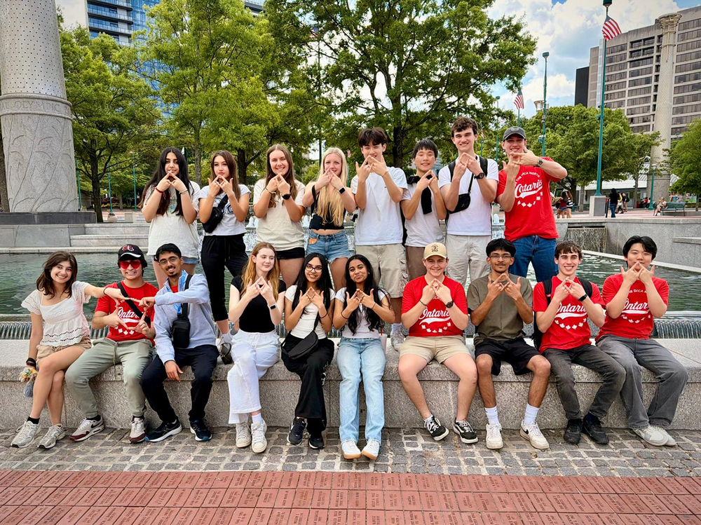 A large group of students pose for a photo
