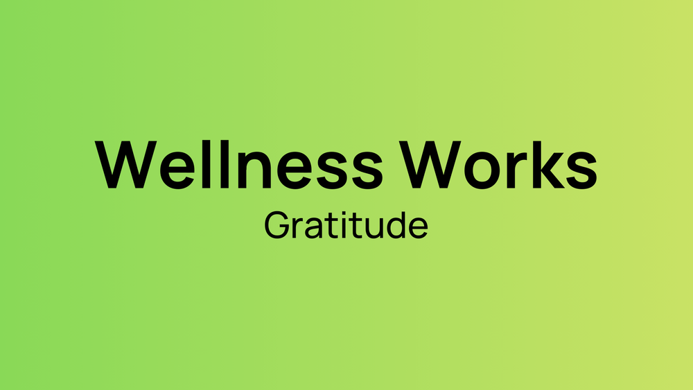 A green background, wellness works gratitude 