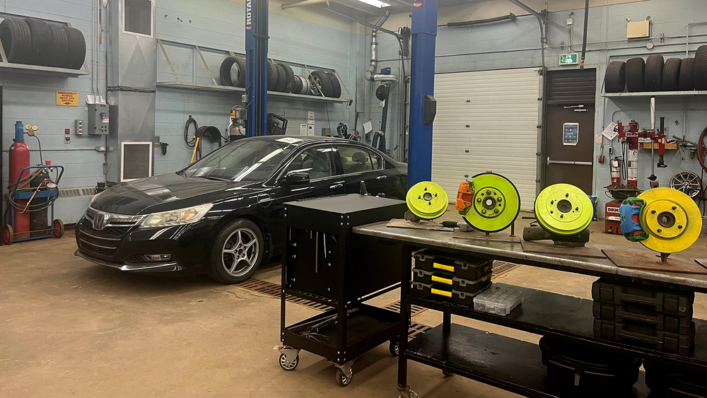 A car is pictured in an auto shop.
